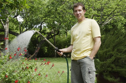Team performing garden clearance tasks